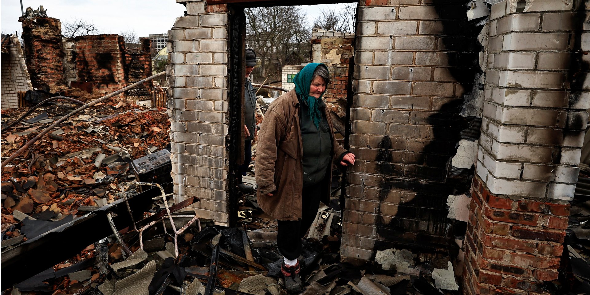 Natalia Tytova, a 62-year-old resident of Chernihiv, a city in north-central Ukraine, shows the ruins of her house, which was destroyed by Russian troops. (Photo: REUTERS/Zohra Bensemra)
