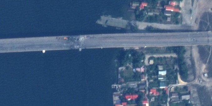 Bridge appears intact, but damage visible from space and no vehicles using crossing (Photo: @ArtisanalAPT)