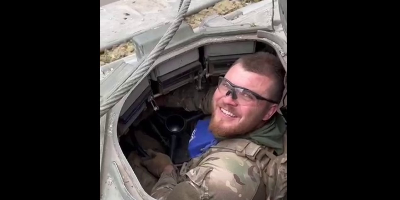 One of the insurgents said that the captured APC previously belonged to the Russian FSB (Photo: Video screenshot Russian Volunteer Corps/Telegram)