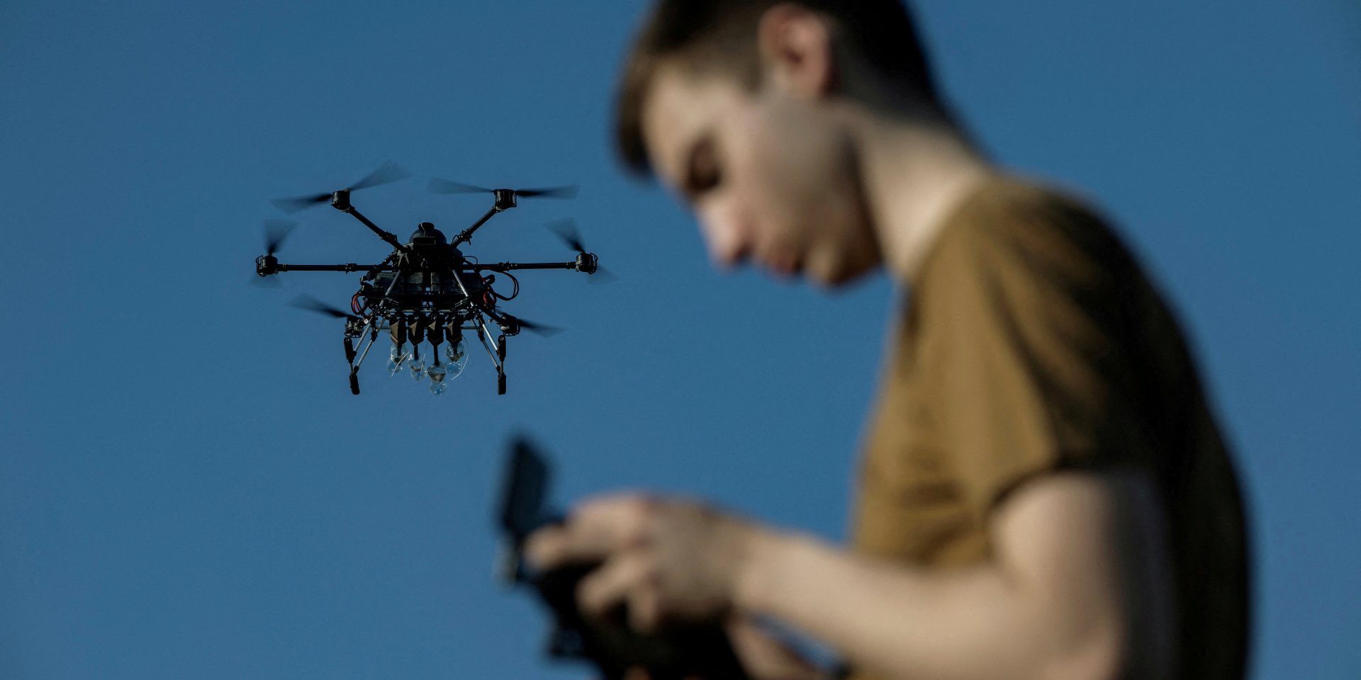 Ukrainian serviceman of the 13th operational NGU Khartiia Brigade with the call signs 'Chipok' controls the Vampire drone during test and training flight (Photo: REUTERS/Marko Djurica/File Photo)