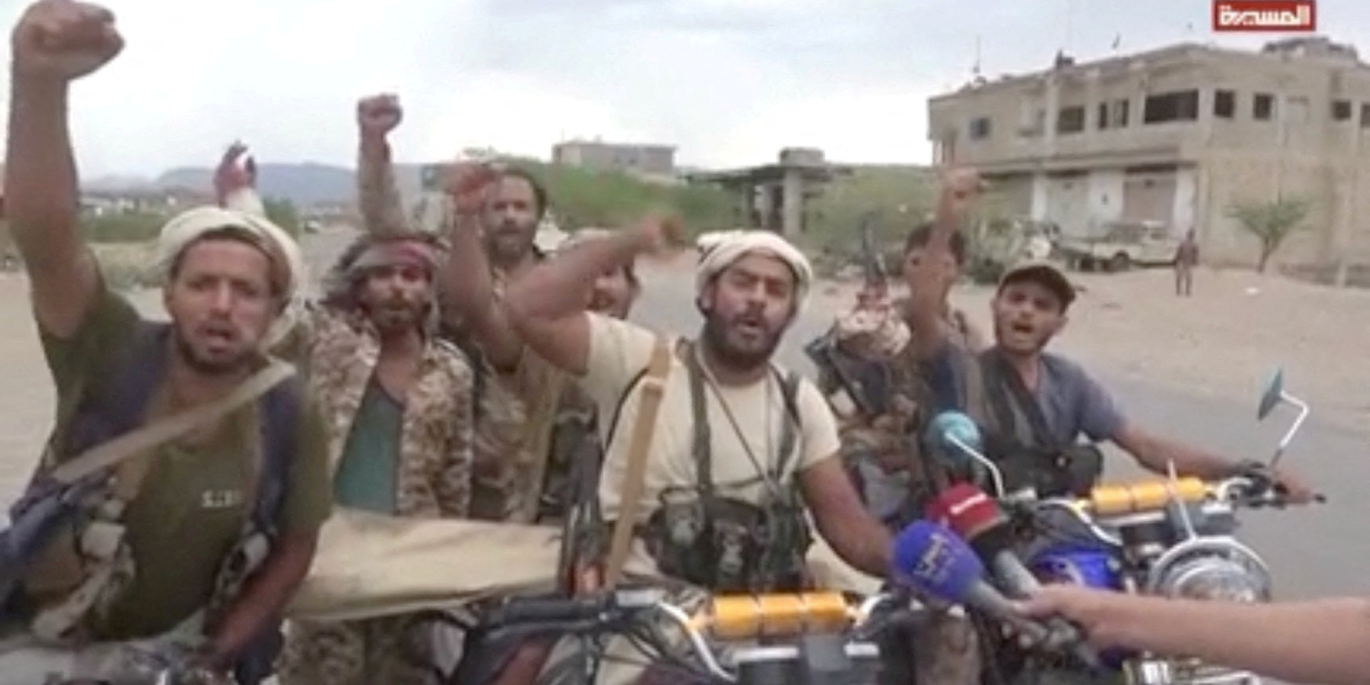 Yemeni Houthis celebrate the capture of the port of Mocha near the city. The image is described as a screenshot from a Sept. 11 video. (Photo: AL-MASIRAH TV/Handout via REUTERS)
